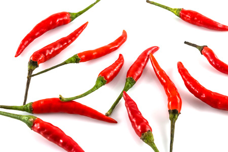 Fresh red  juicy peppers isolated on white background