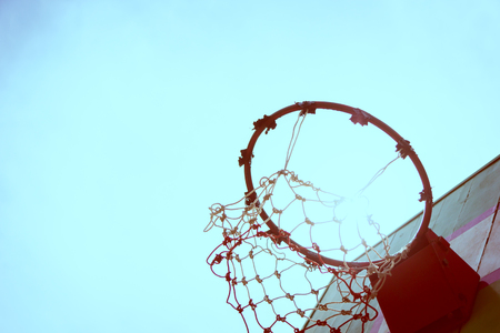 Vintage  Old Wooden basketball hoop under the sunset that mean hit the target