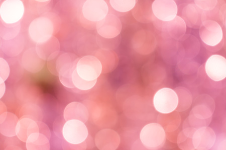 abstract orange,white and pink silver bokeh background with textureの写真素材