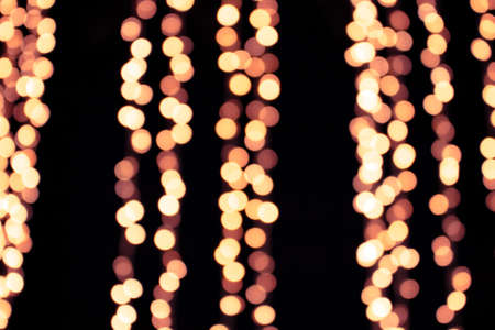 Blurry light orange circlesbackgroundの写真素材