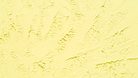 Yellow vintage wall texture  for backgroundの写真素材