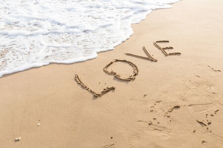 love message written in sand backgroundの写真素材