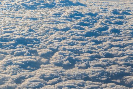 Fluffy clouds view from the plane for blackground