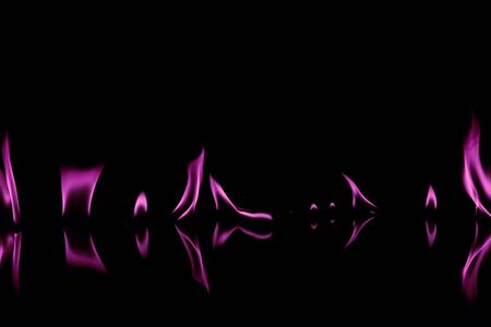 Pink Fire flames on black backgroundの写真素材