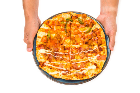 Two hand send the  Delicious italian pizza over white to youの写真素材