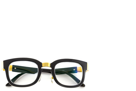 Black and gold glasses isolated on white background
