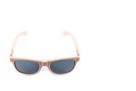 pink sunglasses on white backgroundの写真素材