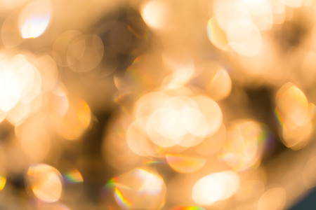 Blur Golden bokeh from beautiful crystal chandelier bokeh