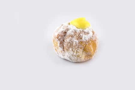 Closeup of Sweet Powdered sugar crusty donuts on white backgroundの写真素材