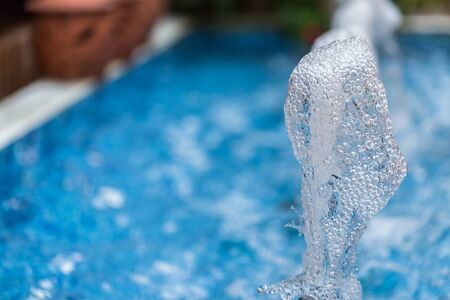 close up water fountain in the pool