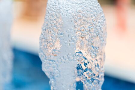 close up water fountain in the poolの写真素材