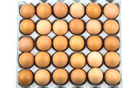 Fresh Eggs in the package isolated on white background