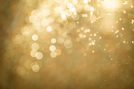 Abstract golden bokeh backgroundの写真素材