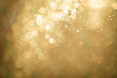 Abstract golden bokeh backgroundの写真素材