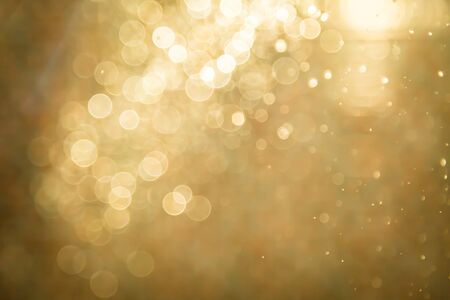Abstract golden bokeh backgroundの写真素材