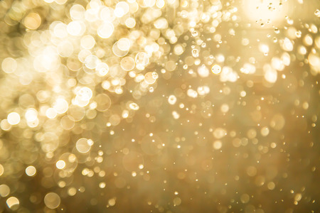 Abstract golden bokeh backgroundの写真素材