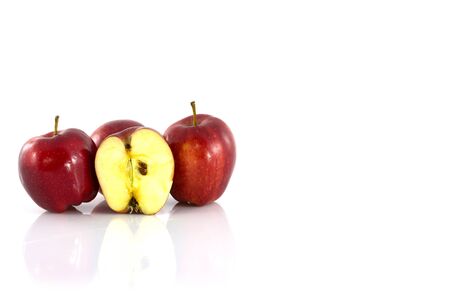 Fresh Red apple and half of red apple isolated on white backgroundの写真素材