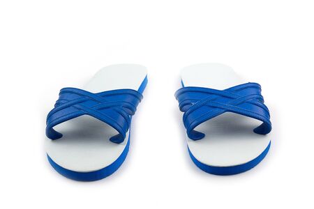 Blue and white Rubber slipper isolated on white backgroundの写真素材