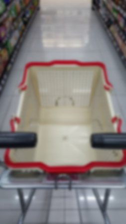 blurred photo of Cart in the super market ,department store backgroundの写真素材