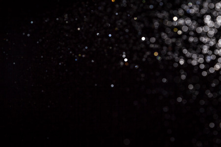 black bokeh on black use for backgroundの写真素材