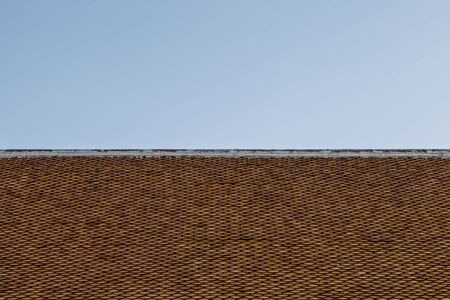 Orange Roof tiles of Buddhist temple use for background