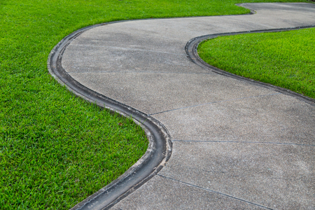 walk way on green grass backgroundの写真素材