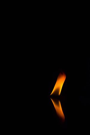 Fire flames on a black backgroundの写真素材