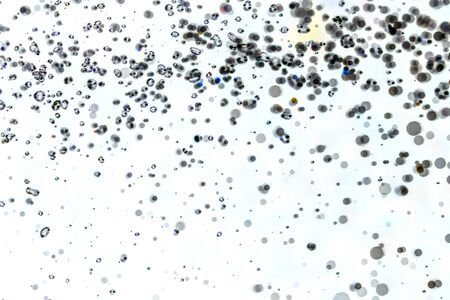 Abstract bokeh texture on white backgroundの写真素材