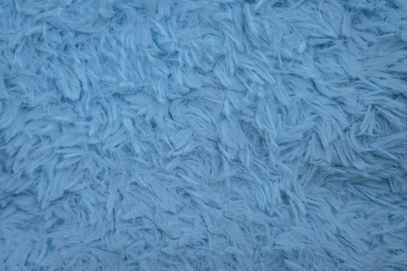 Beautiful sparkling artificial blue fur texture backgroundの写真素材