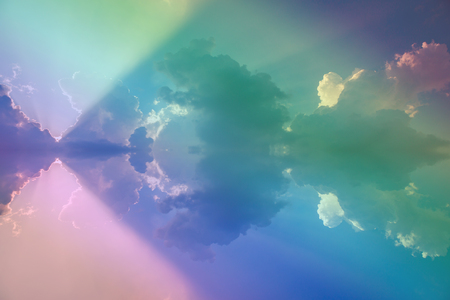 Sunbeam through the haze on blue sky use for backgroundの写真素材