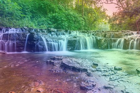 Green forest waterfall nature backgroundの写真素材