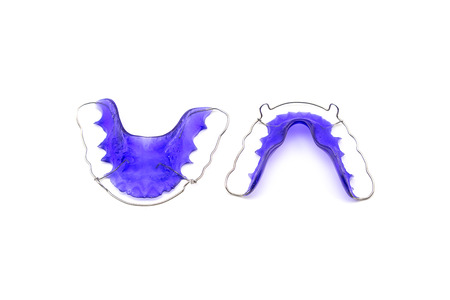 Blue dental braces retainer isolated on white backgroundの写真素材