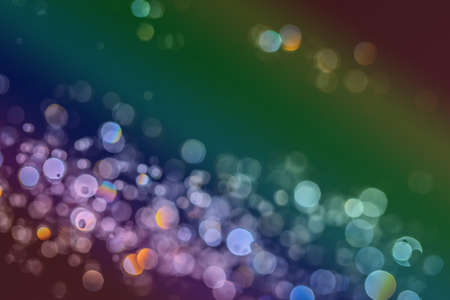 Abstract bokeh  texture on black backgroundの写真素材