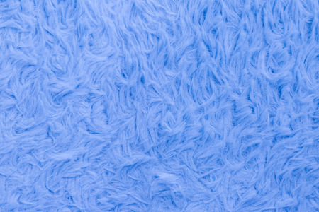 Beautiful sparkling artificial blue fur texture backgroundの写真素材