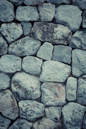 Closeup of Gray strong stone wall texture use for background