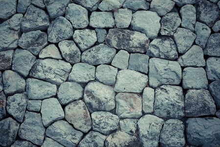 Closeup of Gray strong stone wall texture use for background