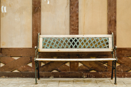 Vintage wooden chair  with old wood backgroundの写真素材