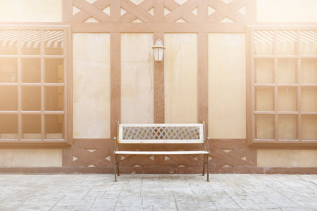 Vintage wooden chair  with old wood backgroundの写真素材