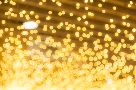 Blur of golden bokeh backgroundの写真素材