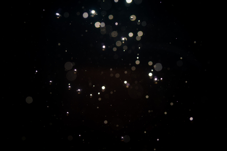 Black abstract bokeh backgroundの写真素材