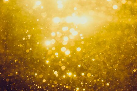 Gold abstract bokeh backgroundの写真素材