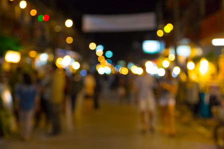 Blur with bokeh of night market at the city backgroundの写真素材