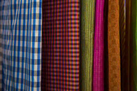 Raw of colorful Thai silk handcraft old vintage torn from natural materials  texture backgrounの写真素材