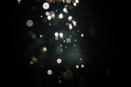 Abstract blur bokeh on black backgroundの写真素材