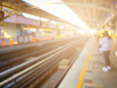 Blurred image of train station before sunset , BTS skytrain at Bangkok, Thailandの写真素材