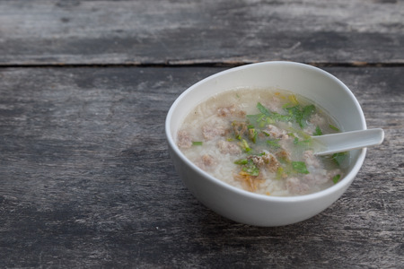 Boiled pork on wooden table Breakfast Thai style in morningの写真素材