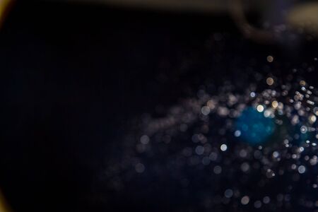 Colorful Bokeh on black backgroundの写真素材