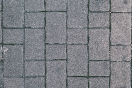 Roads, paved walkways, stone blocks background