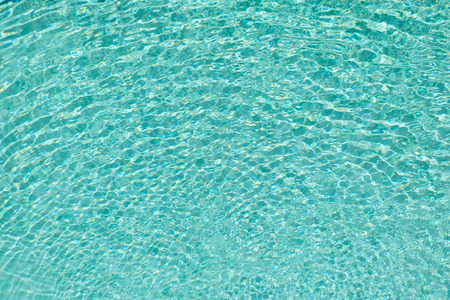 Blue color of wave and reflection in the swimming pool