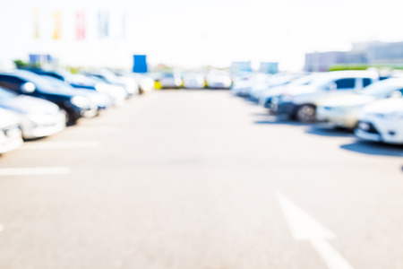 Blur of car in the car park backgroundの写真素材